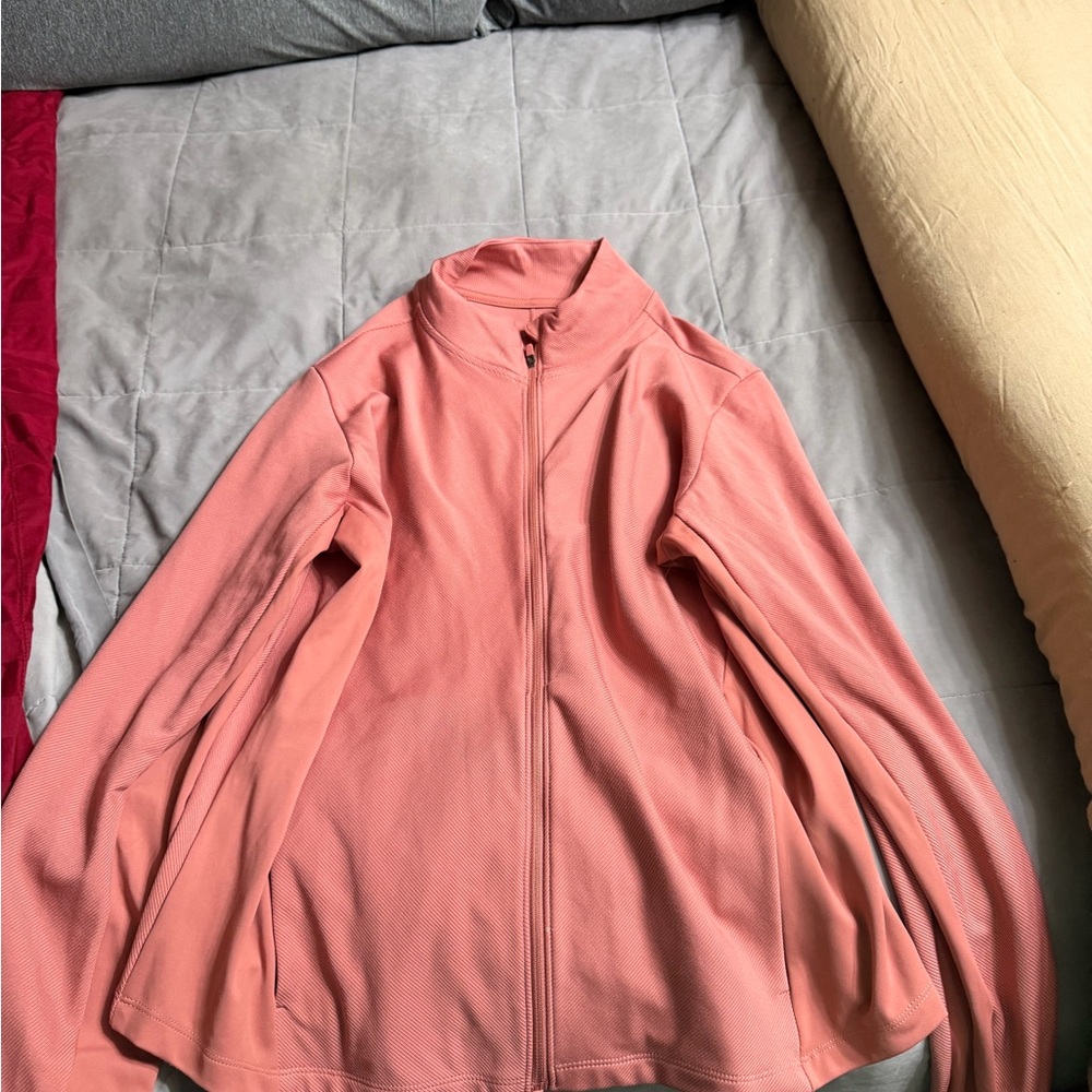 Nike Women's coral zip up.